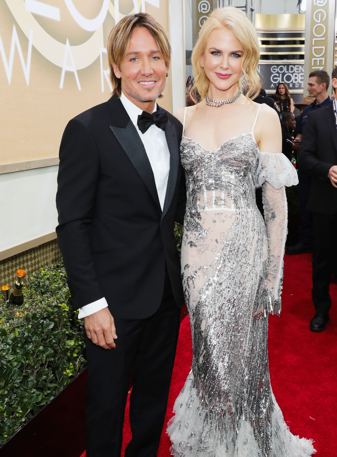 BEVERLY HILLS, CA - JANUARY 08: 74th ANNUAL GOLDEN GLOBE AWARDS -- Pictured: (l-r) Recording artist Keith Urban and actress Nicole Kidman arrive to the 74th Annual Golden Globe Awards held at the Beverly Hilton Hotel on January 8, 2017. (Photo by Neilson Barnard/NBCUniversal/NBCU Photo Bank via Getty Images)